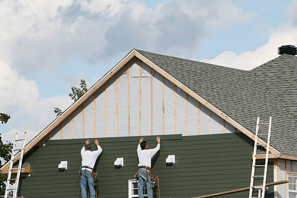 Professional Siding Installation technician working in Oxford, NC